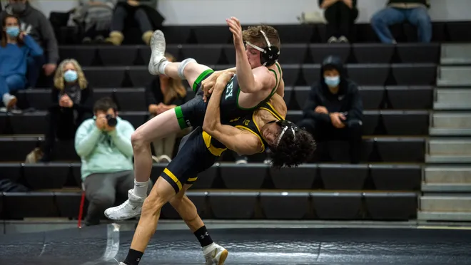 River Dell wrestler executing a throw